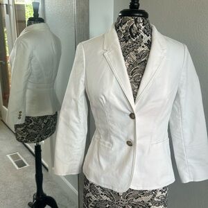 Limited white jacket, quarter length  sleeves excellent used condition.